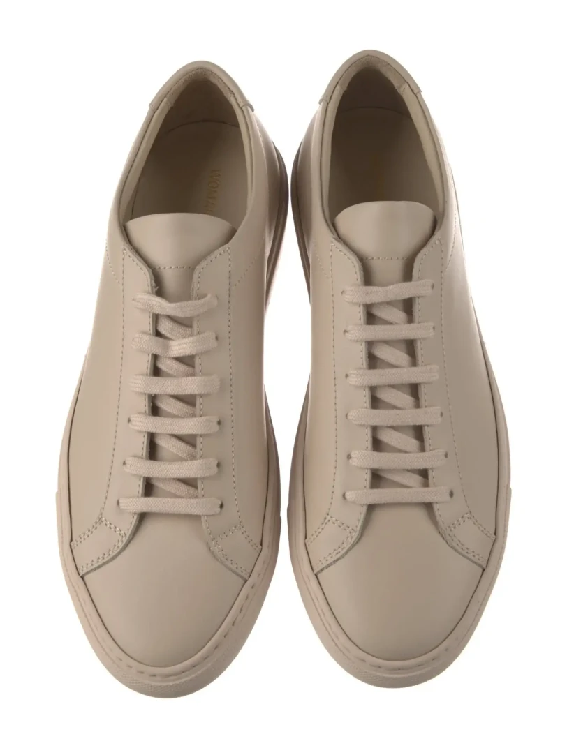 Woman by Common Projects trainers