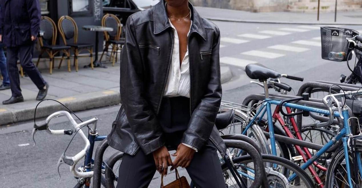 Woman wearing black leather jacket